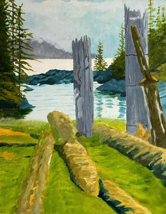 Decaying totem poles in Ninstints, Haida Gwaii