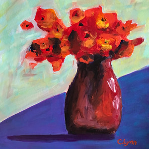 Red Flowers In Red Vase